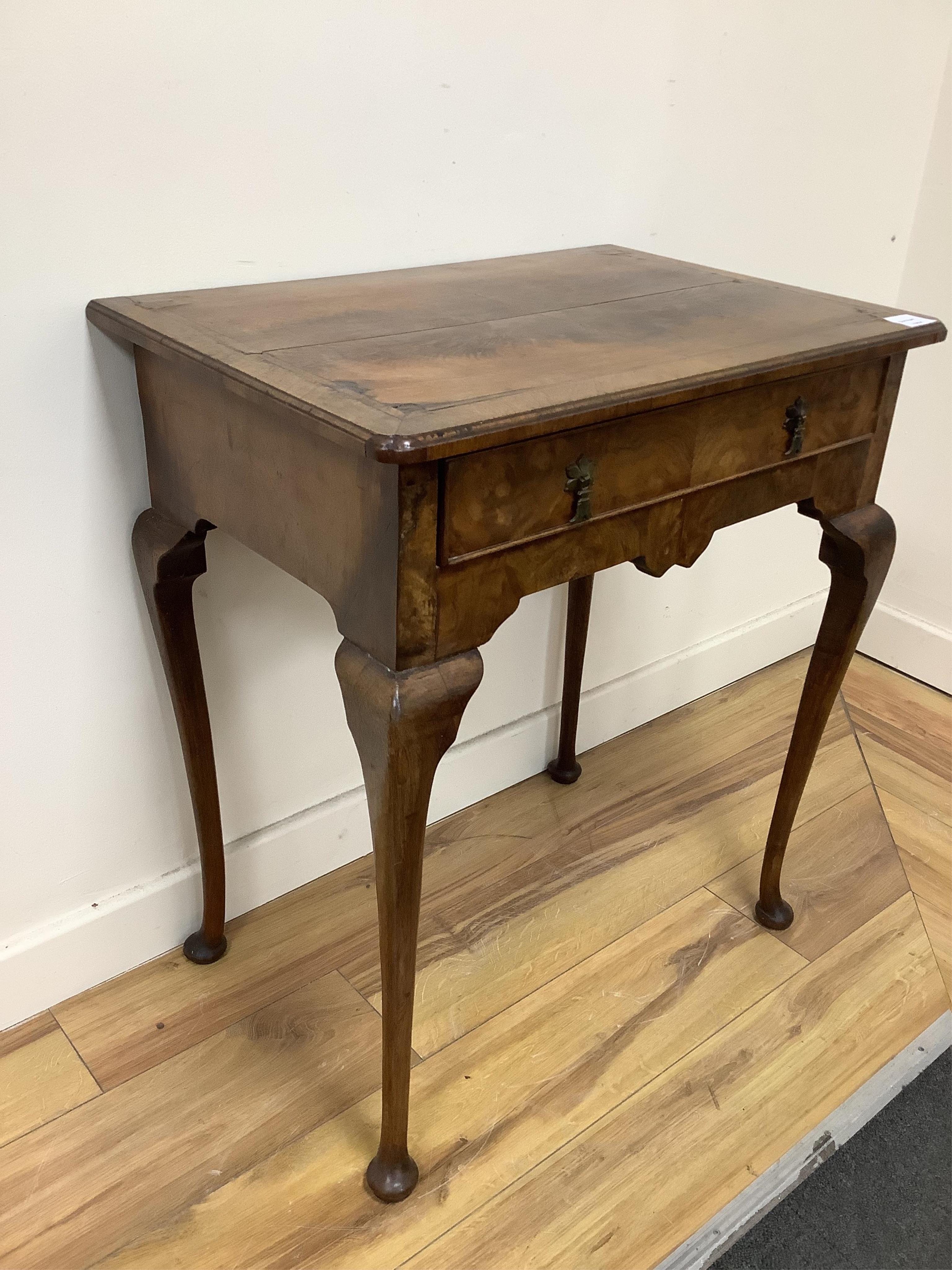 A George I style feather banded walnut side table, width 63cm, depth 44cm, height 71cm. Condition - fair